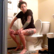 A slender girl with tattoos sits down on a toilet, cuts some wet, gurgling farts, pisses, and takes a shit with an audible plop. She wipes her ass when finished. Presented in 720P HD. About 5 minutes.